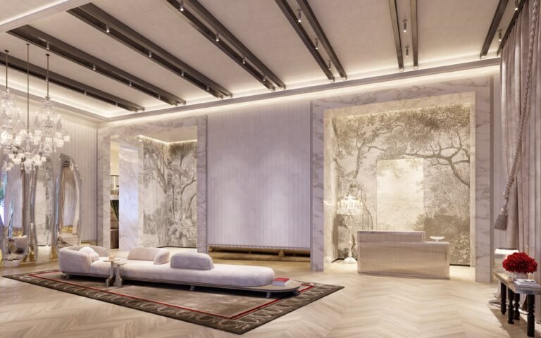 Elegant front desk and lounge area at Baccarat Residences Brickell with marble walls, chandeliers, and custom mural.
