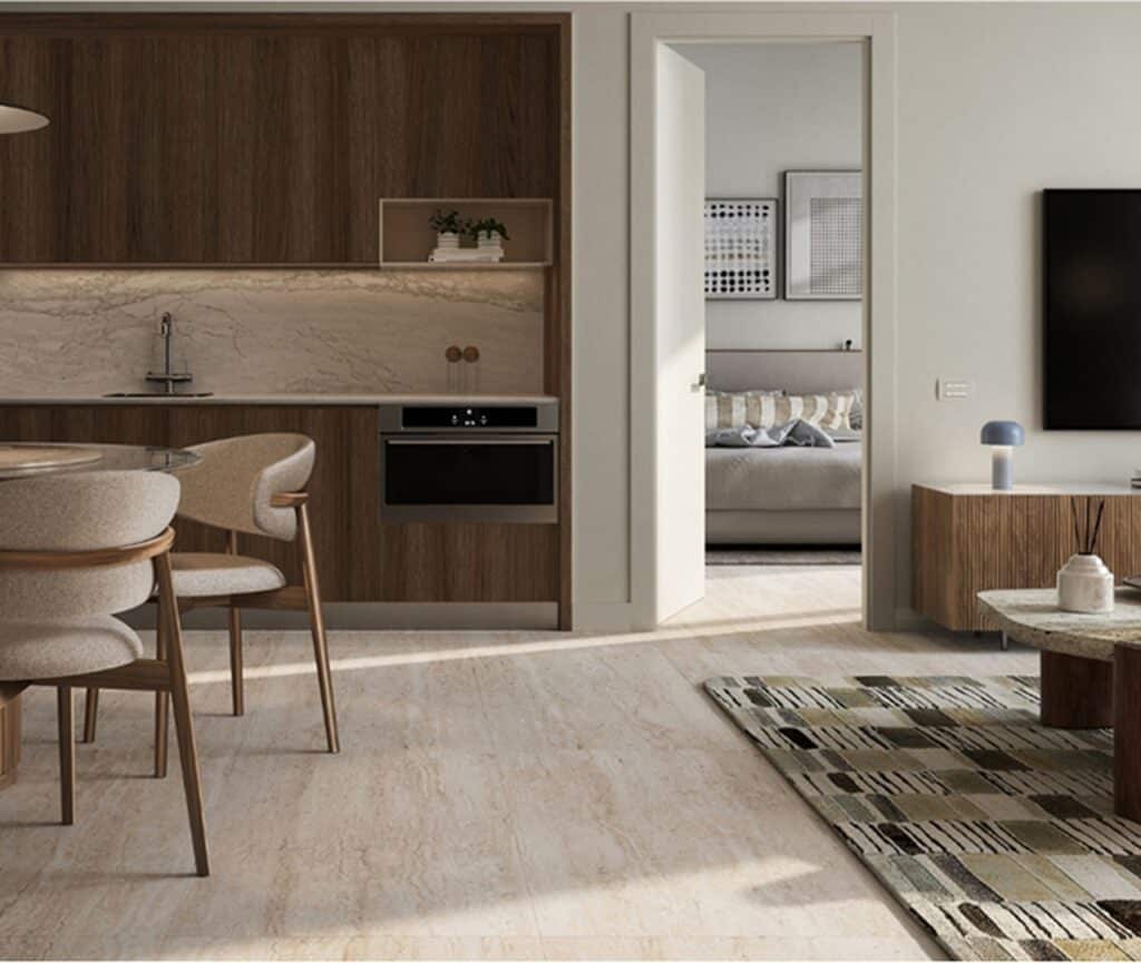 Open-concept condo kitchen and living room featuring spacious layout, modern design, and large windows with scenic views