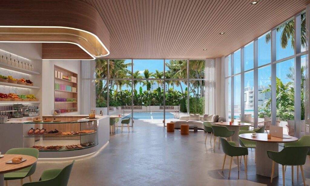 Modern cafe with large windows revealing a sunny outdoor pool and lush palm trees. Bright and airy interior with green chairs and wooden accents.
