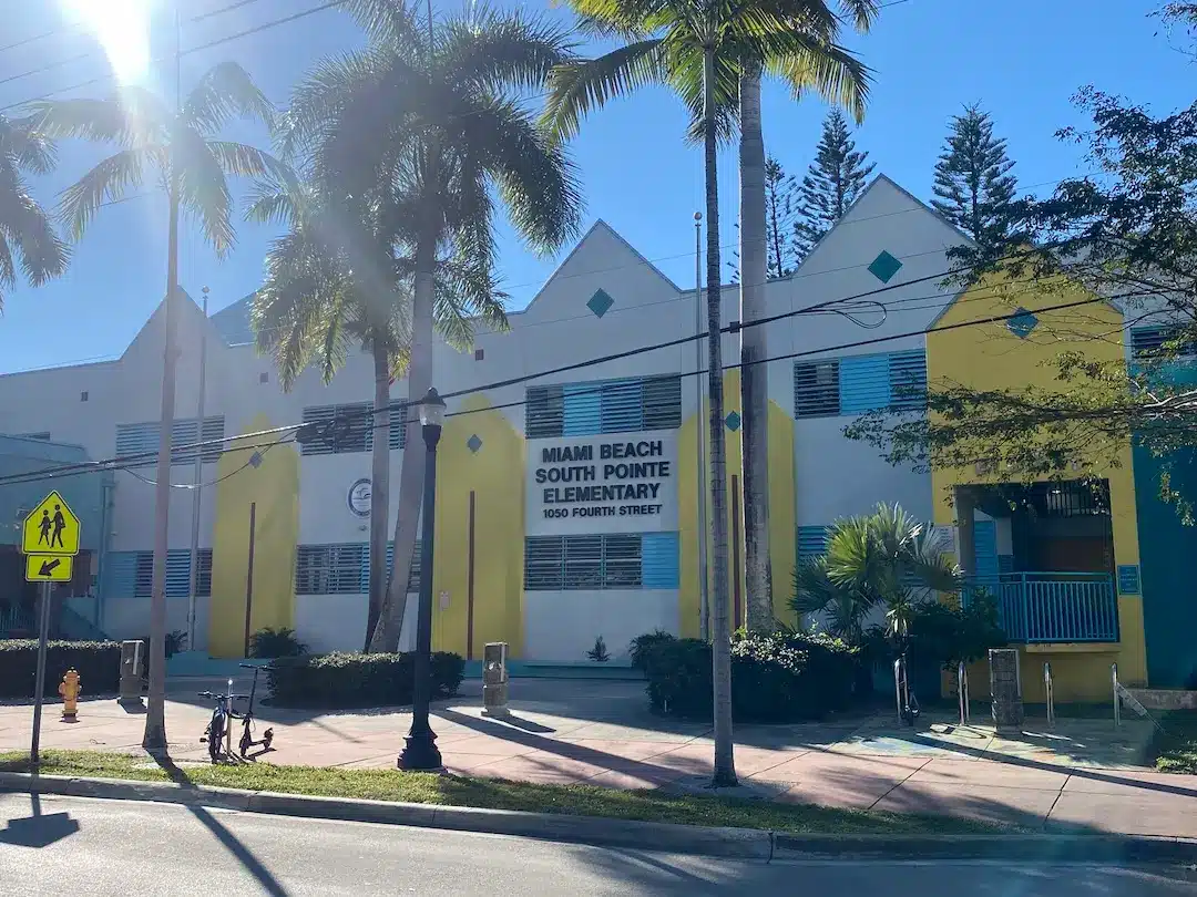 South Pointe Elementary School in South of Fifth, Miami Beach, set among palm trees near South Pointe Park.