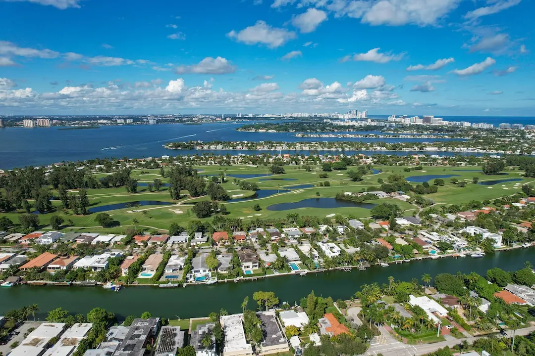 Aerial view of Normandy Island, Miami Beach with waterfront homes, canals, and Normandy Shores Golf Club.