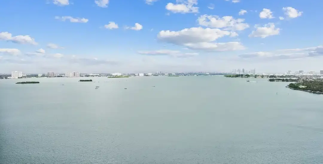 Wide Biscayne Bay views from North Bay Village with Miami skyline in distance.